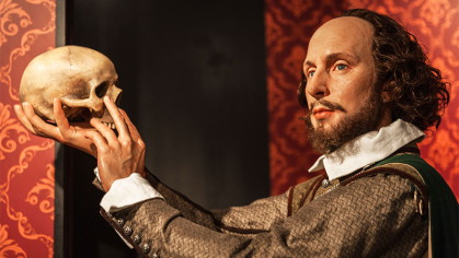 William Shakespeare holding a skull