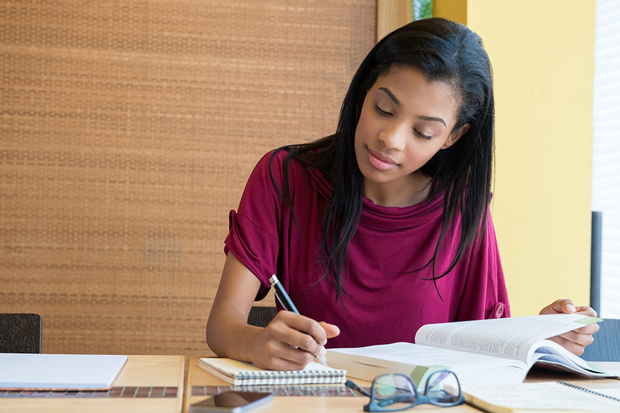 Woman creating a study plan