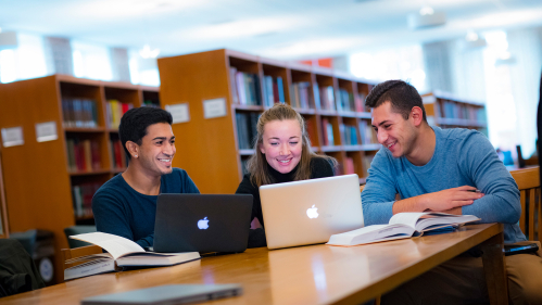 Rutgers students in the library