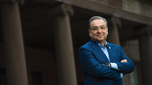 Antonio Calcado, the executive vice president for strategic planning and  operations and chief operating officer, Institutional Planning and Operations, stands outside Winants Hall at Rutgers University–New Brunswick.