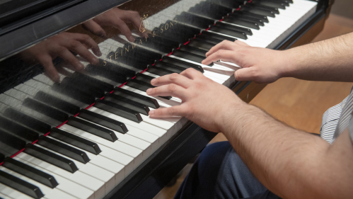 Yerko Difonis playing the piano