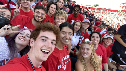 Rutgers-New Brunswick sophomore Bianca Caproni, center, at a Rutger football game with new friends she made during second-year orientation.