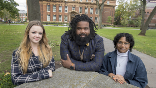 Diversity Peer Educators Brittany Burke (SEBS '23), left, and Ashlee Bonsi (SAS '23), right, flank Darnell Thompson, assistant director of education with the Center for Social Justice Education and LGBT Communities.