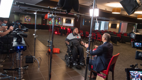 Rutgers president  Jonathan Holloway meets with Eric LeGrand