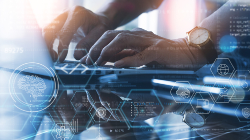 a person at a computer using AI