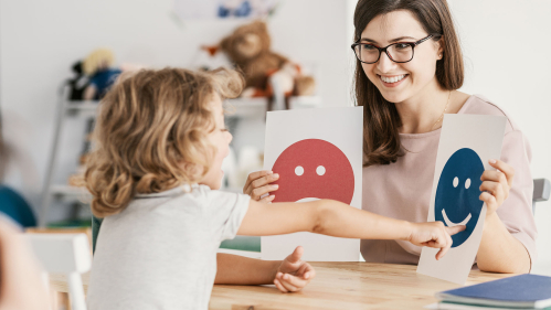 therapist treats girl with ASD