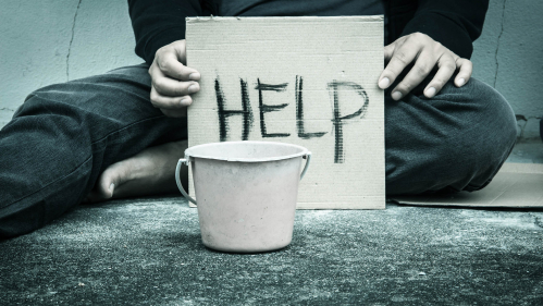 Unhoused person asking for help.