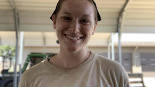 Johanna Cordasco smiles for the camera at  Bent's Old Fort in southeastern Colorado, where AmeriCorps members worked to help restore the former fur trading post.