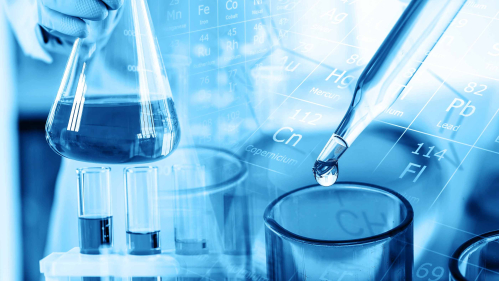 Beakers and other labware with a blue tint.