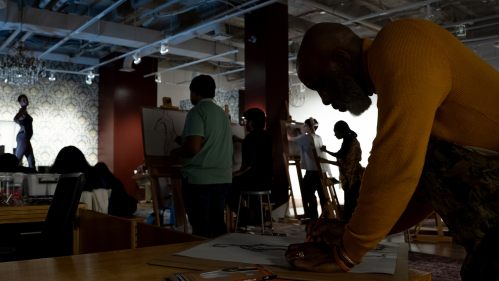 Newark resident Gary Campbell works on a sketch during the "Drawing Circle" at Express Newark on Jan. 29, 2026.