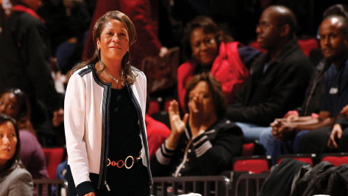 C. Vivian Stringer, seen here standing in front of the crowd.