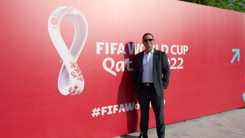 Kenneth Greenblatt infront of World Cup sign