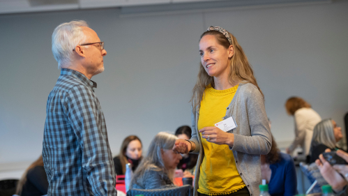 Phil Wisneski speaks with Liz Ryan at the Office of Continuing Professional Education Event