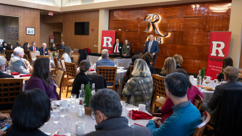 President Holloway speaking at the podium at the Presidential Employee Excellence Recognition Program 