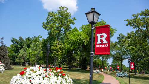 Bright banners line Sacred Path on the Douglass campus
