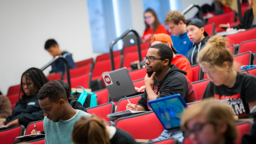 Director of Undergraduate Studies in Journalism and Media Studies Steve Miller delivers lecture in the academic building lecture hall