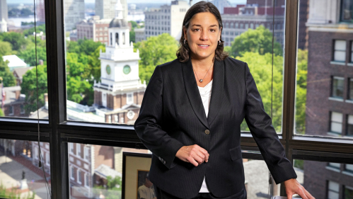 Alumna Jacqueline Romero in her spacious Philadelphia office.