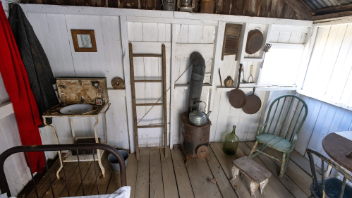 This one-room shack was restored to represent the home of George "Peg Leg" Van Camp. A one-legged grave digger who lived on the property a century ago.