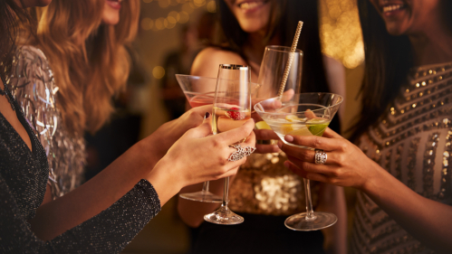 women toasting with wine glasses