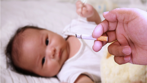 parent smoking by baby