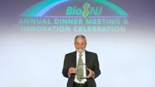 Brian Strom, chancellor of Rutgers Biomedical and Health Sciences, receives the Heart of BioNJ Award during an awards dinner June 9 held by BioNJ, a New Jersey-focused, life-sciences trade association.