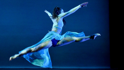 Rutgers BFA student Christine Evans dancing on stage