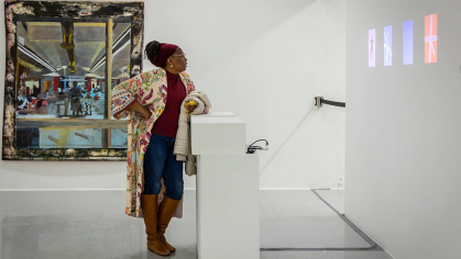 Visitors at the Rutgers Mason Gross galleries look at artwork