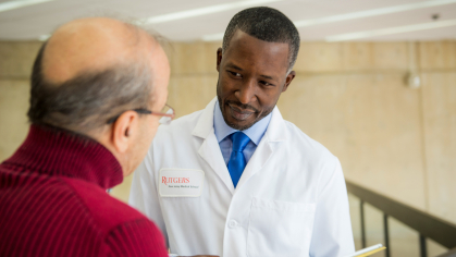 health care specialist with patient