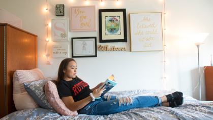 Student in a dorm room