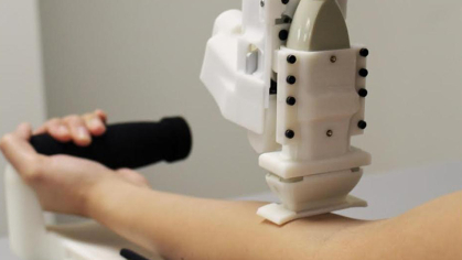 A hand-held automated venipuncture device