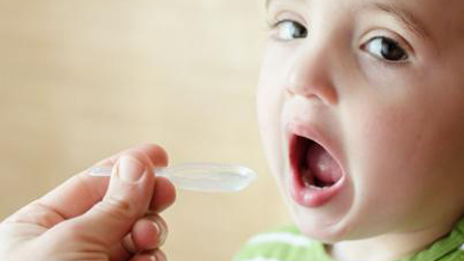 A child taking medication