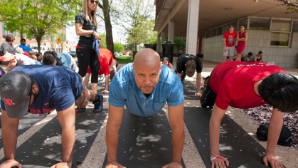 (middle) Marko Robinson and (right) Bryan Ung participate in Recreation activity promoting healthy activities to community members. 2019