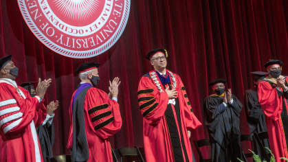 Jonathan Holloway acknowledges the standing ovation he received after concluding his inaugural address.