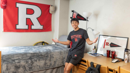 Ethan Thai, 18, moved into his room Wednesday under the spotlight of an NBC television camera crew.