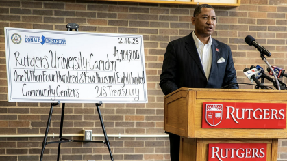 Chancellor Tillis With Check for Community Center Grant