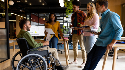 Stock art that shows a person in a wheel chair in the workforce 