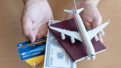 Image of credit cards money and airplane
