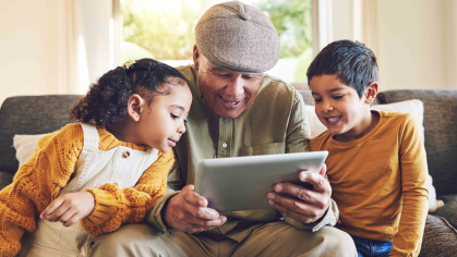 Grandparents and kids on tablet