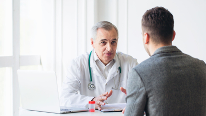 patient consults with doctor