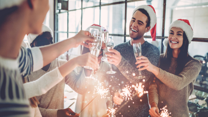 People toasting at holiday party