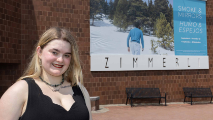 Gabrielle Carmella, a senior attending the Mason Gross School of the Arts, helped Zimmerli Art Museum officials prepare for the "Smoke & Mirrors" exhibition.
