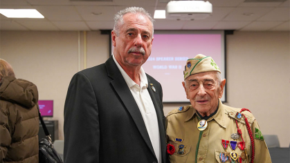 Veteran Jake Ruser standing next to Rutgers–Camden Director of Veterans Affairs Fred Davis