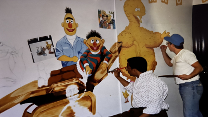 Dentists paint mural for pediatric practice