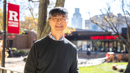 Professor Kwangwon Lee standing on the Rutgers-Camden Quad