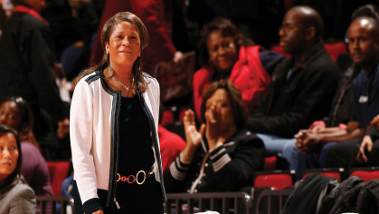 C. Vivian Stringer, seen here standing in front of the crowd.