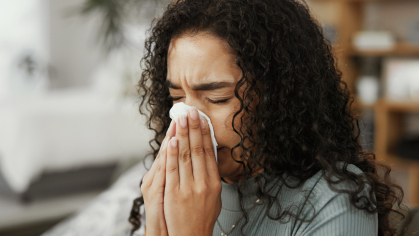 Women who is sick with flu symptoms 