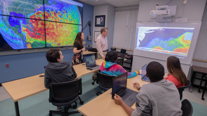 Rutgers Center for Ocean Observing Leadership students sitting during class