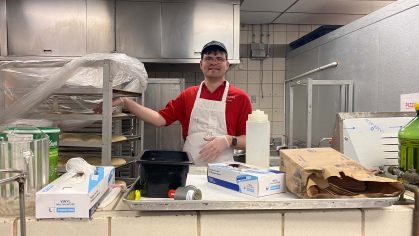 Scott rolling pizza dough 