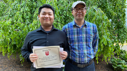 Shiming Liu and Jinglin Fu, associate professor of chemistry