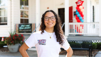 Alejandra Afanador, an RU Voting Ambassador, stands outside the Center for Latino Arts and Culture during a voter registration event on Sept. 22.